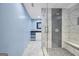 Modern bathroom features glass shower and custom vanity at 70 Barrington Farms Ct, Sharpsburg, GA 30277