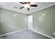 Bedroom featuring a ceiling fan and neutral paint at 70 Barrington Farms Ct, Sharpsburg, GA 30277