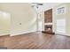 Spacious living room with stone fireplace, vaulted ceilings, and modern ceiling fan at 70 Barrington Farms Ct, Sharpsburg, GA 30277