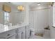 Bathroom features white subway tile and black and white patterned tile flooring at 140 Newhaven Dr, Fayetteville, GA 30215