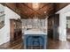 Kitchen with hardwood floors, stylish lighting, a large center island, and ample cabinet space at 140 Newhaven Dr, Fayetteville, GA 30215