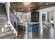 Spacious kitchen featuring a large center island, modern appliances, and hardwood floors at 140 Newhaven Dr, Fayetteville, GA 30215
