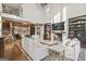 Bright and spacious living room with cathedral ceiling, fireplace, and open floor plan to kitchen at 140 Newhaven Dr, Fayetteville, GA 30215