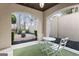 Charming outdoor patio with seating area, fire pit, and landscaped yard at 140 Newhaven Dr, Fayetteville, GA 30215