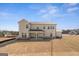 Exterior view of the home with a spacious backyard and covered patio, perfect for entertaining at 315 Arwen Dr # 105, Mcdonough, GA 30252