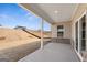 Covered patio overlooks a serene backyard with natural surroundings and privacy at 315 Arwen Dr # 105, Mcdonough, GA 30252