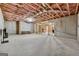 Unfinished basement with concrete flooring and walls featuring exposed ceiling insulation at 108 White Oak Tl, Cumming, GA 30028