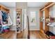 Walk-in closet with custom shelving and a full-length mirror at 108 White Oak Tl, Cumming, GA 30028