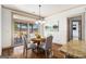 Cozy breakfast nook with backyard views and access to the outdoor patio at 1 Red Oak Trl, Sharpsburg, GA 30277