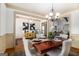 Elegant dining room with a chandelier and stylish furnishings, perfect for entertaining at 1 Red Oak Trl, Sharpsburg, GA 30277