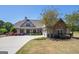 Charming single-Gathering home featuring manicured landscaping and a welcoming entrance at 1 Red Oak Trl, Sharpsburg, GA 30277