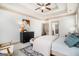 Spacious main bedroom featuring neutral paint, trey ceilings, fan and attached ensuite bathroom at 1 Red Oak Trl, Sharpsburg, GA 30277