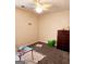 Cozy bedroom with carpet, natural light, and a ceiling fan at 1592 Smithson Ct, Lithonia, GA 30058