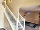 Entryway leading to an elegantly lit dining area with an area rug at 1592 Smithson Ct, Lithonia, GA 30058