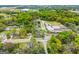 Aerial view of community near a local school, set in a lush landscape at 1202 Emory St, Oxford, GA 30054