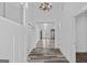 Bright foyer with hardwood flooring leading into an open-concept layout at 1202 Emory St, Oxford, GA 30054