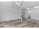 Bright and open living space featuring modern floors and neutral walls at 1202 Emory St, Oxford, GA 30054