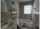 Bathroom features original fixtures and plenty of storage at 1243 Hill Nw St, Conyers, GA 30012
