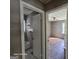 This bathroom connects to a bedroom and features a pink tile tub and sink at 1243 Hill Nw St, Conyers, GA 30012