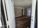 An entryway with a view into the living room and hallway at 1243 Hill Nw St, Conyers, GA 30012