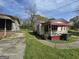 A small single Gathering home with red awning over the porch at 1243 Hill Nw St, Conyers, GA 30012