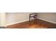 Attic space with hardwood flooring and clean white baseboards at 75 Prestwick Ln, Peachtree City, GA 30269