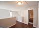 The attic has hardwood floors and a door to an unfinished area at 75 Prestwick Ln, Peachtree City, GA 30269