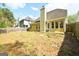Large backyard with a mature tree line offering ample shade at 75 Prestwick Ln, Peachtree City, GA 30269