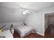 Bedroom featuring gray walls, ceiling fan, and hardwood floors at 75 Prestwick Ln, Peachtree City, GA 30269