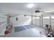 Spacious two car garage with ample storage and a new garage door at 75 Prestwick Ln, Peachtree City, GA 30269