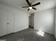 This bedroom features gray wood-look floors and neutral walls at 1397 Iron Gate Blvd, Jonesboro, GA 30238