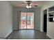 This living room provides access to the deck at 1397 Iron Gate Blvd, Jonesboro, GA 30238