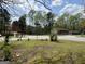 A street view in front of a home with green grass and a fire hydrant visible at 1397 Iron Gate Blvd, Jonesboro, GA 30238