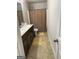Bathroom featuring double vanity, neutral tile, and a shower with curtain at 1461 Judson Way, Riverdale, GA 30296