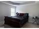 Bedroom featuring a comfortable bed, natural lighting, and neutral walls at 1461 Judson Way, Riverdale, GA 30296