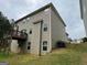 Rear exterior of a two-story home featuring a deck with railing at 1461 Judson Way, Riverdale, GA 30296