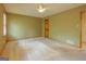 Bedroom with a ceiling fan, soft carpet, and neutral paint at 115 Bob White Trl, Fayetteville, GA 30215