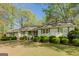Charming single-story home with manicured lawn and mature landscaping, great curb appeal at 115 Bob White Trl, Fayetteville, GA 30215