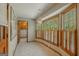 Bright sunroom with windows and tile flooring at 115 Bob White Trl, Fayetteville, GA 30215