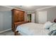 Bedroom featuring a large wooden armoire and view into the hallway at 217 Brunswick Dr, Tyrone, GA 30290
