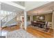 Open layout with a dining room connecting to a staircase and other rooms at 217 Brunswick Dr, Tyrone, GA 30290