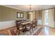 Formal dining area featuring hardwood floors, natural light, and classic details at 217 Brunswick Dr, Tyrone, GA 30290