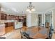 Beautiful kitchen with wood cabinets, stainless steel appliances, and granite countertops at 217 Brunswick Dr, Tyrone, GA 30290