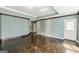 Spacious living room features stained concrete floors, decorative trim and plenty of natural light at 217 Brunswick Dr, Tyrone, GA 30290
