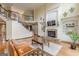 Stunning living room with fireplace, hardwood floors, and staircase at 217 Brunswick Dr, Tyrone, GA 30290