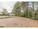 Community playground with swings and a slide near the pool at 217 Brunswick Dr, Tyrone, GA 30290