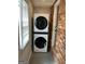 Modern stacked washer and dryer provides space-saving convenience for laundry tasks at 1079 Pine Ne St, Conyers, GA 30012