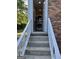 Exterior entrance to the Laundry area featuring a stacked washer and dryer at 1079 Pine Ne St, Conyers, GA 30012