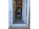 Convenient laundry area features stacked washer and dryer at 1079 Pine Ne St, Conyers, GA 30012