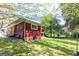 Spacious backyard with mature trees, a well-maintained lawn, and potential for outdoor activities at 3614 Fairburn Nw Pl, Atlanta, GA 30331